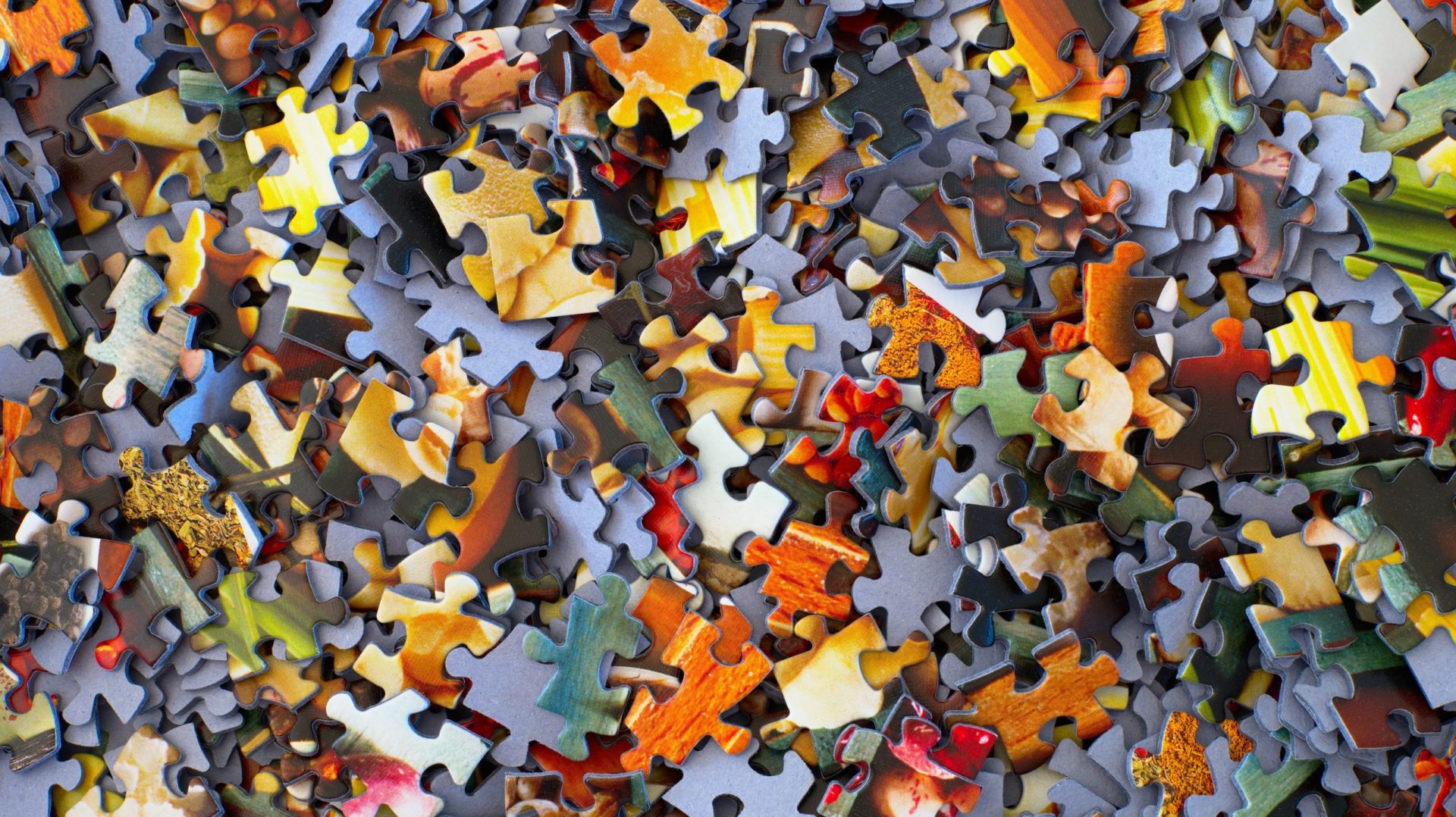 Photo of puzzle pieces by Hans-Peter Gauster on Unsplash