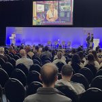 A photograph of an awards announcement at the Health and Care Research Wales Conference 2025.